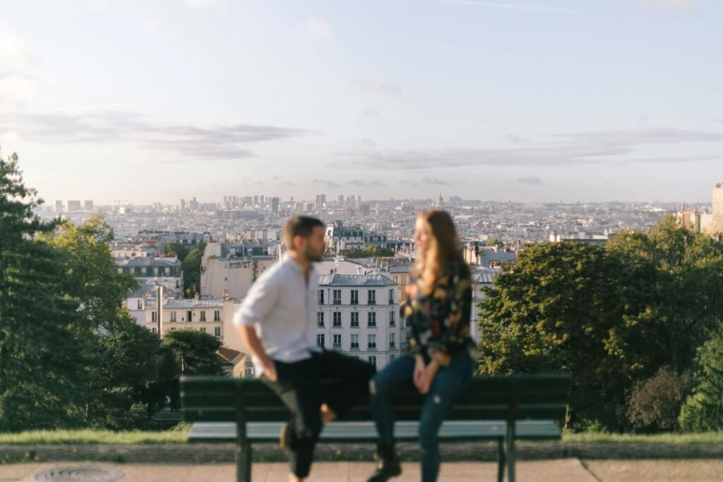pexels-photo-10998338-10998338 A couple enjoying a romantic moment with a beautiful view of Paris cityscape.